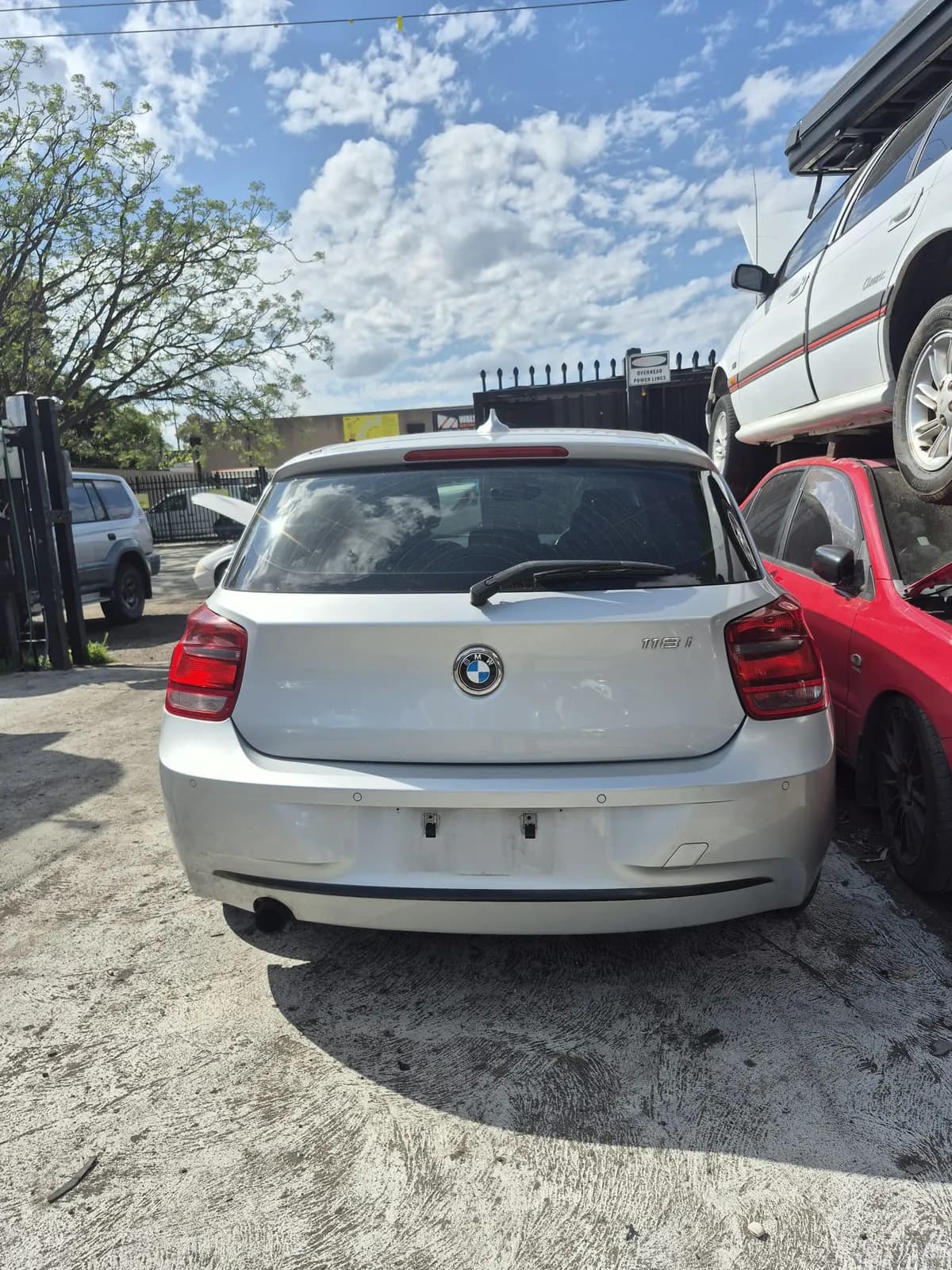 BMW 118i loaded for free removal in Perth by Midland Wreckers
