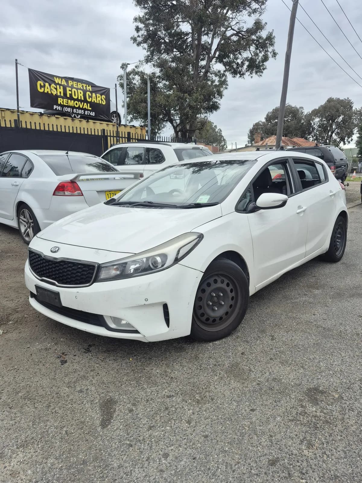 Kia Cerato loaded for free removal in Perth by Midland Wreckers