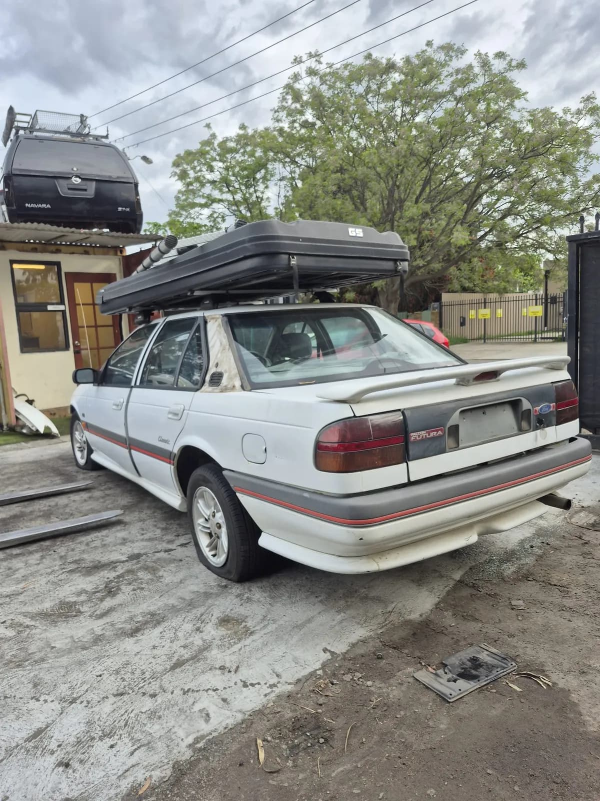 1994 Ford Falcon ED Futura Rolls Into Bellevue — Roof-Top Camping Pod Still On