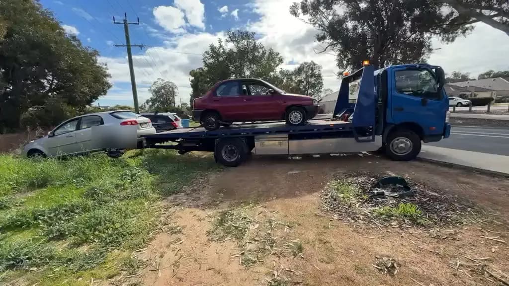 Recent car removal in Queens Park — 1995 Mazda 121
