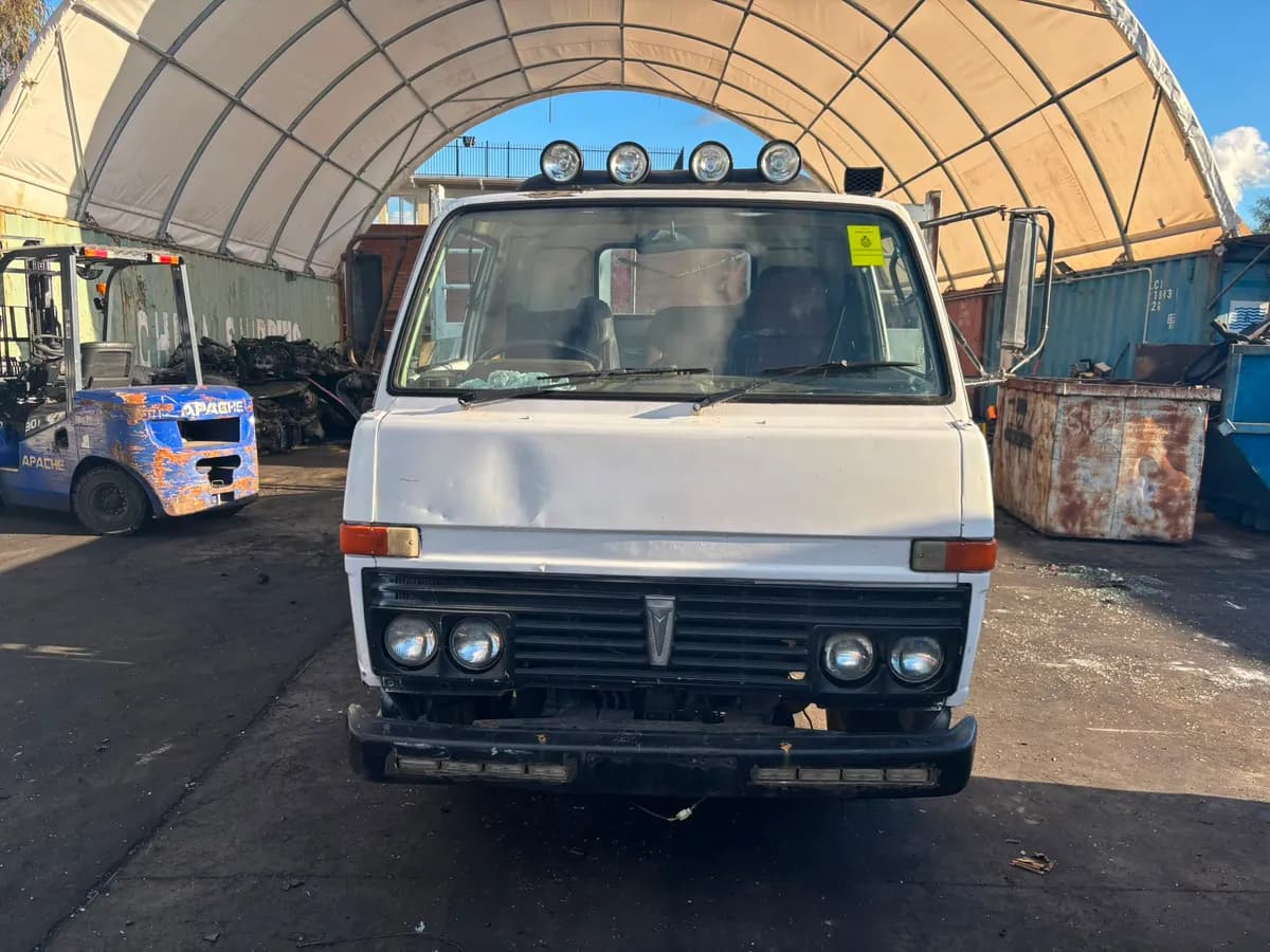 1980 Toyota Dyna truck at Midland Wreckers Bellevue yard ready for dismantling
