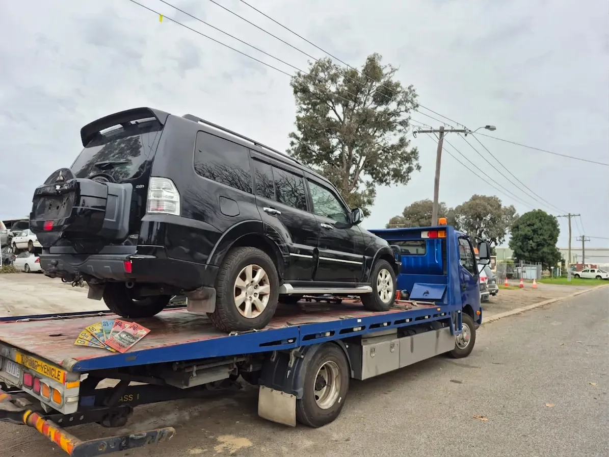 Cash paid on the spot before the vehicle is loaded onto the tow truck at Midland Wreckers.