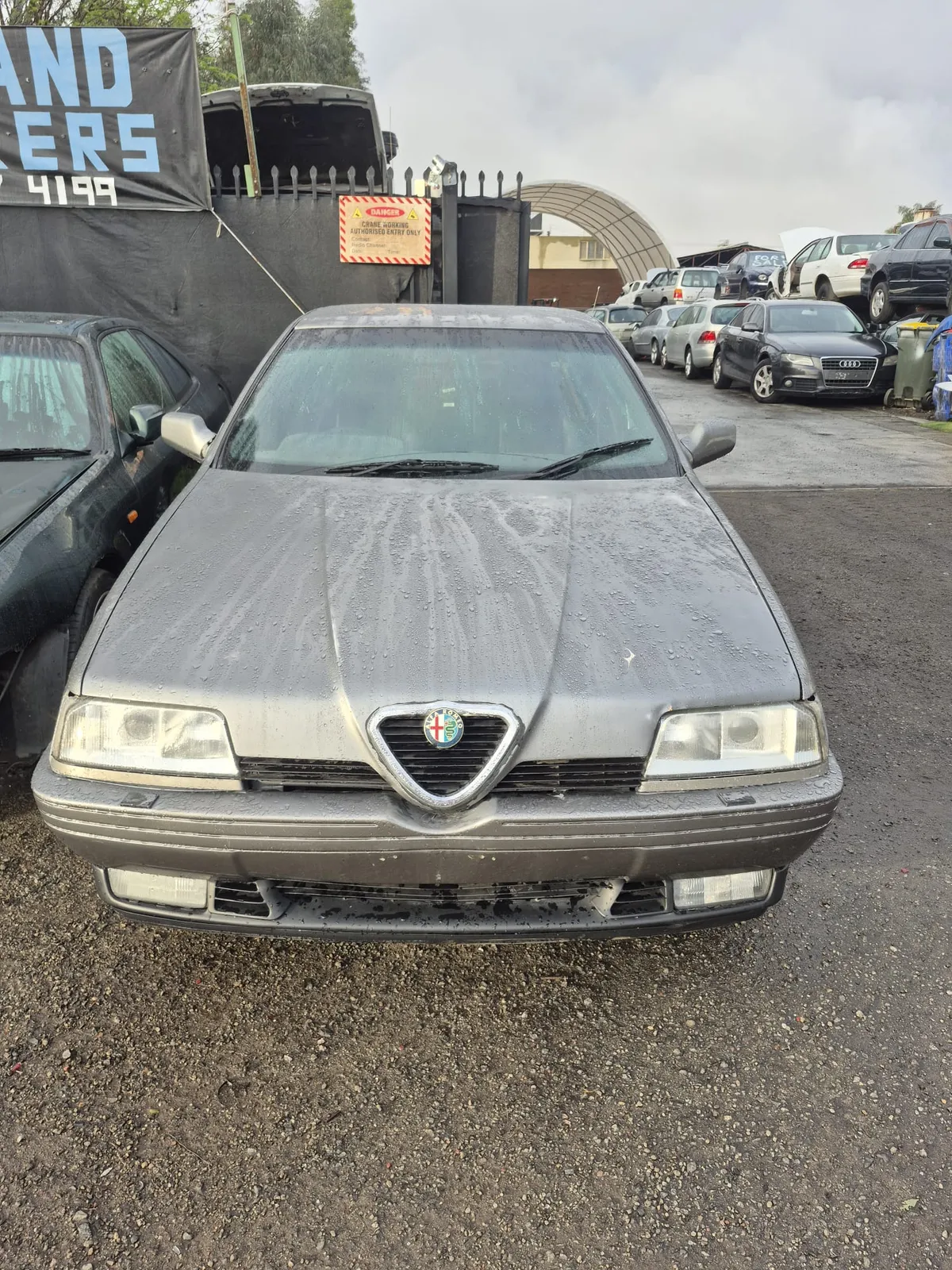 1989 Alfa Romeo 164 3.0 V6 donor at Midland Wreckers Bellevue yard