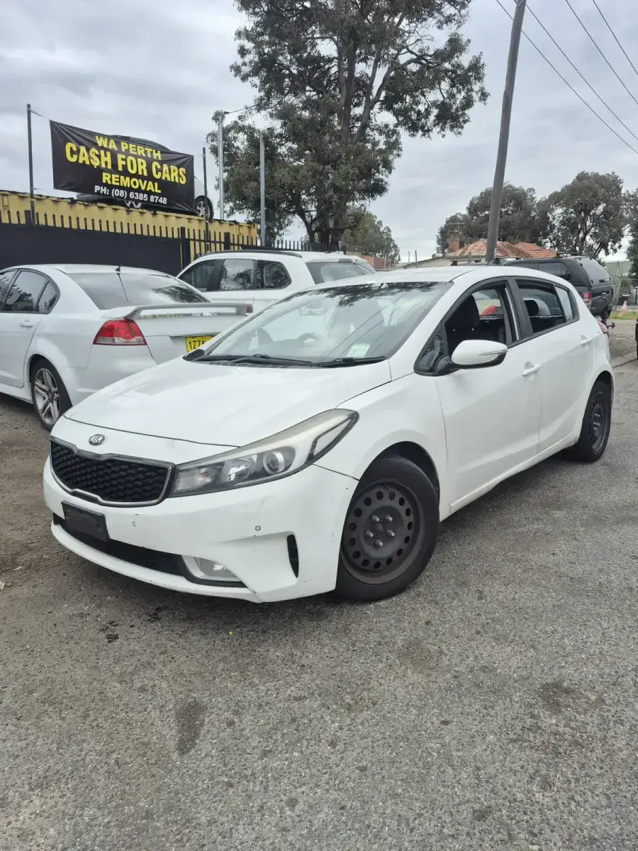 Kia Cerato loaded for free removal in Perth by Midland Wreckers