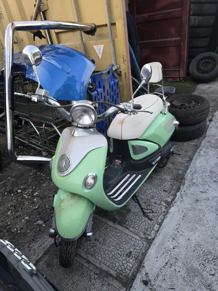 Complete retro scooter at Perth wrecking yard ready for parts salvage